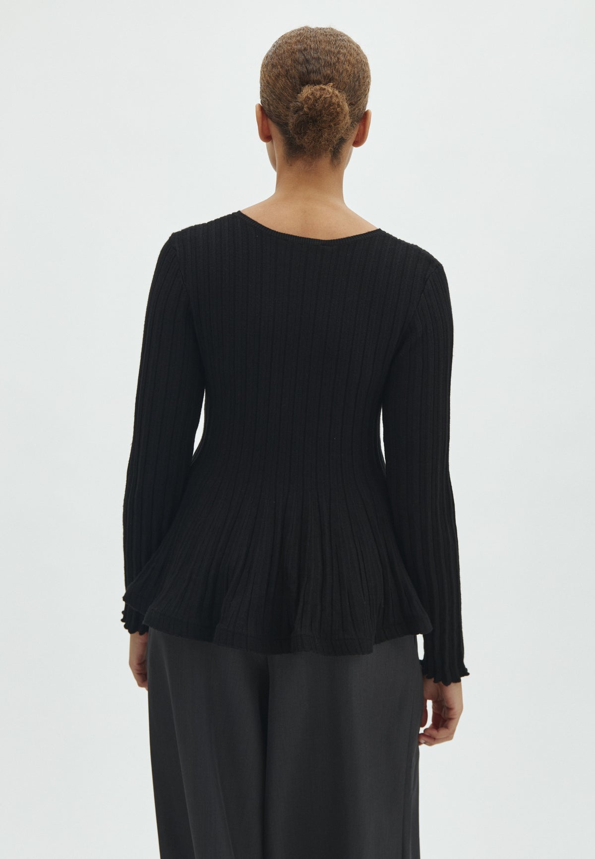 171643 Tallina Peplum Knit Blouse_Black_Model_2